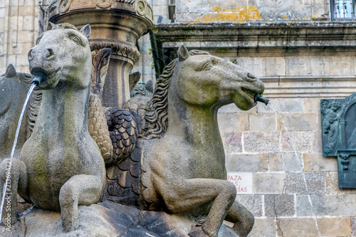 Antique water fountain with horse statues in old town Santiago de Compostela  Spain.