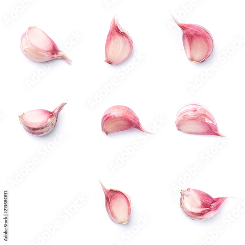 Eight garlic cloves isolated on white
