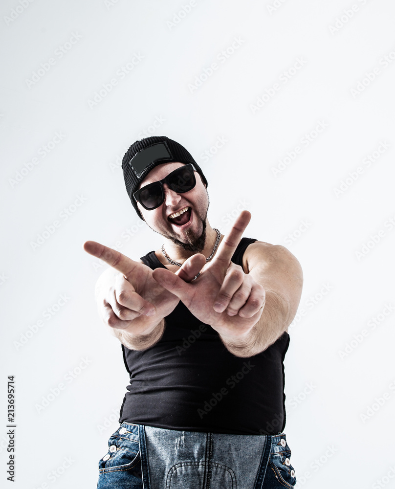 Naklejka premium rapper headphones and dark glasses performs a rap song