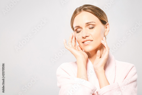 Beauty Woman face Portrait. Beautiful Spa model Girl with Perfect Fresh Clean Skin. Blonde female smiling. Youth and Skin Care Concept