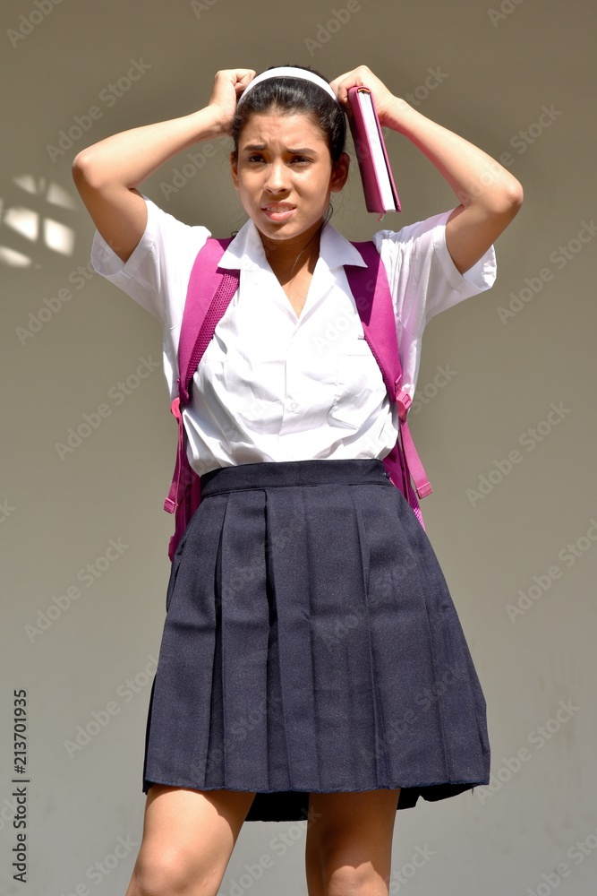 Fototapeta premium Confused Cute Colombian Person With Notebook