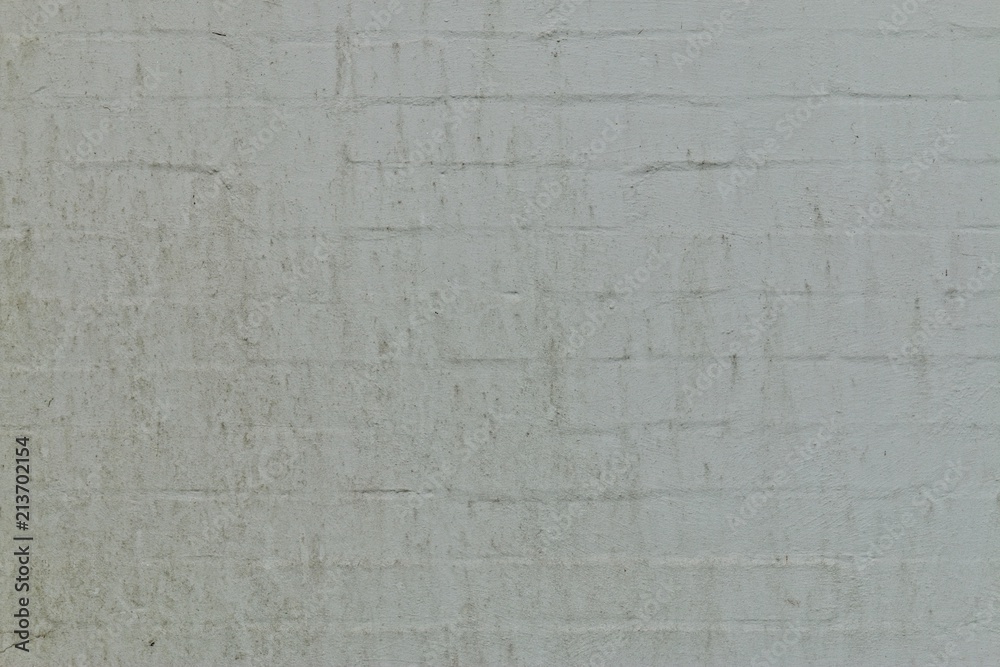 Fototapeta premium Whitewashed stained brick wall