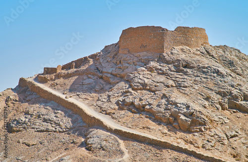 The long way to the ancient Dakhma, Yazd, Iran photo