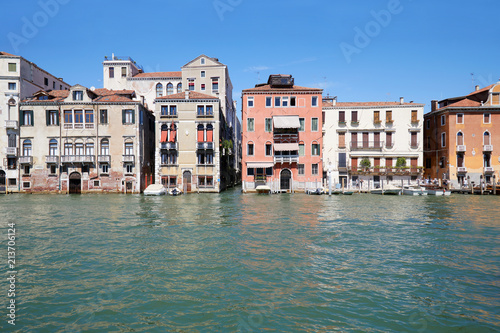 Venice houses facades and the grand canal in a sunny day in Italy © andersphoto