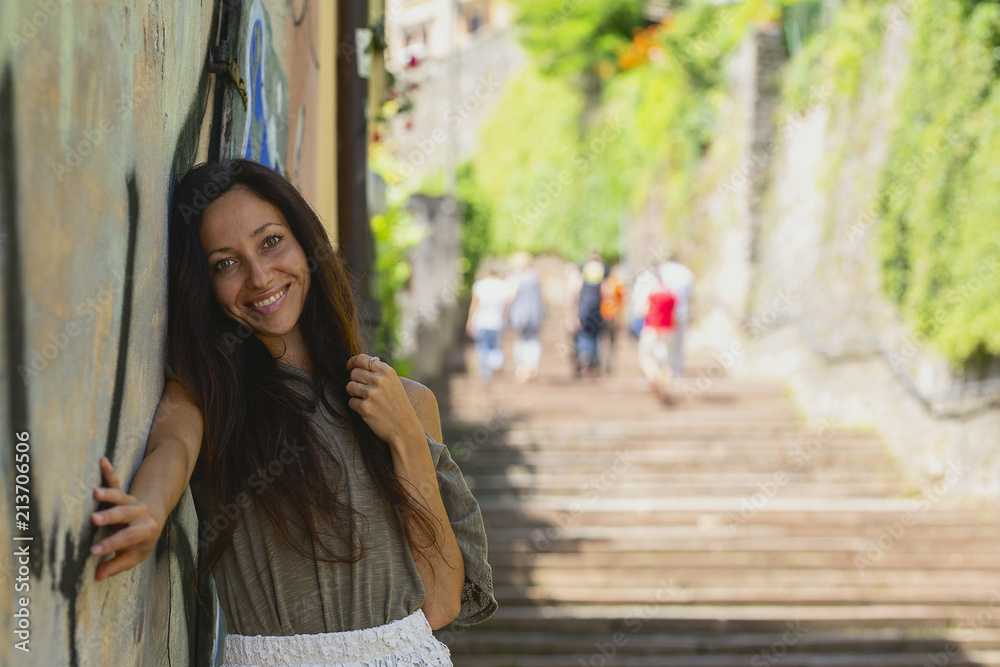 Naklejka premium Beautiful girl on the stairs