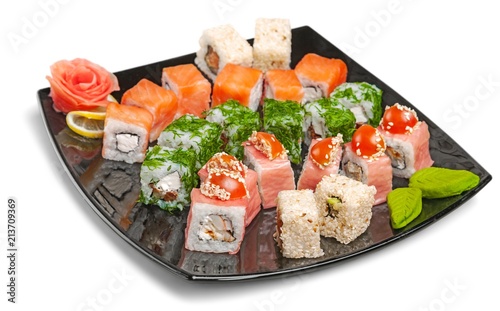 Maki-sushi on black plate