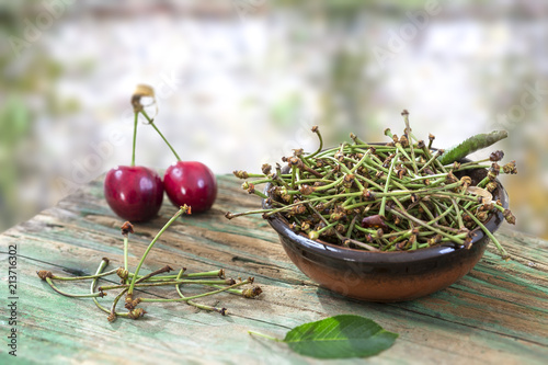 duretic, cherry tails medicine, healthy, herbal tea, virtues on wooden table photo