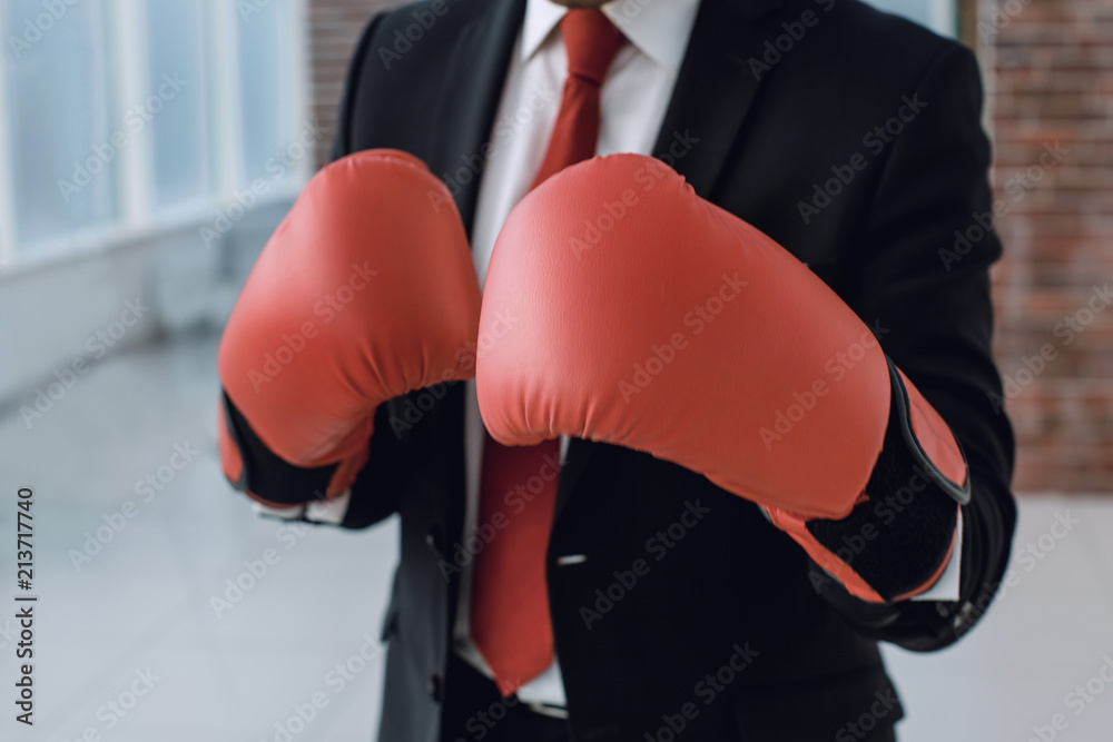 close up.businessman in Boxing gloves