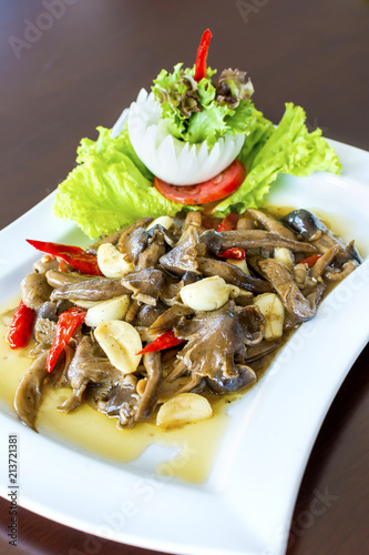 Ehedocn mushrooms fried with oyster sauce the favorite delicious Thai food photo