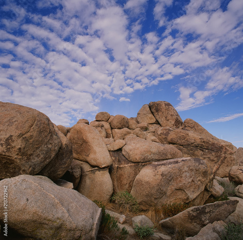 Boulders with clouds
