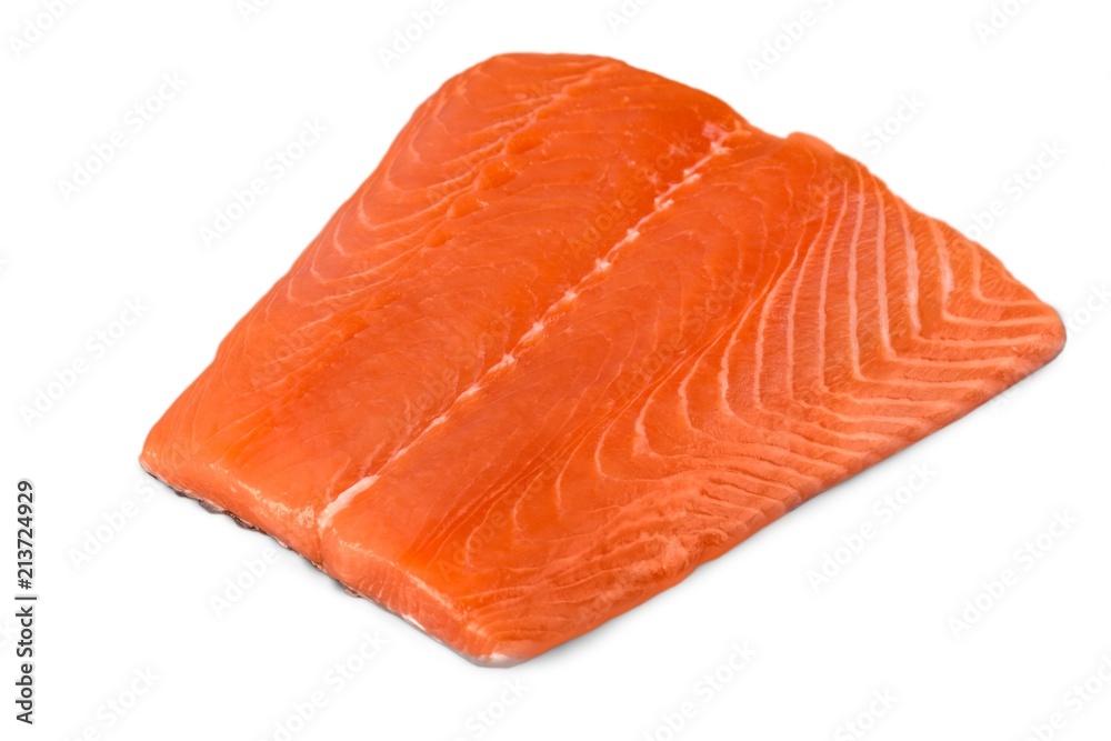 fresh uncooked red fish fillet over white