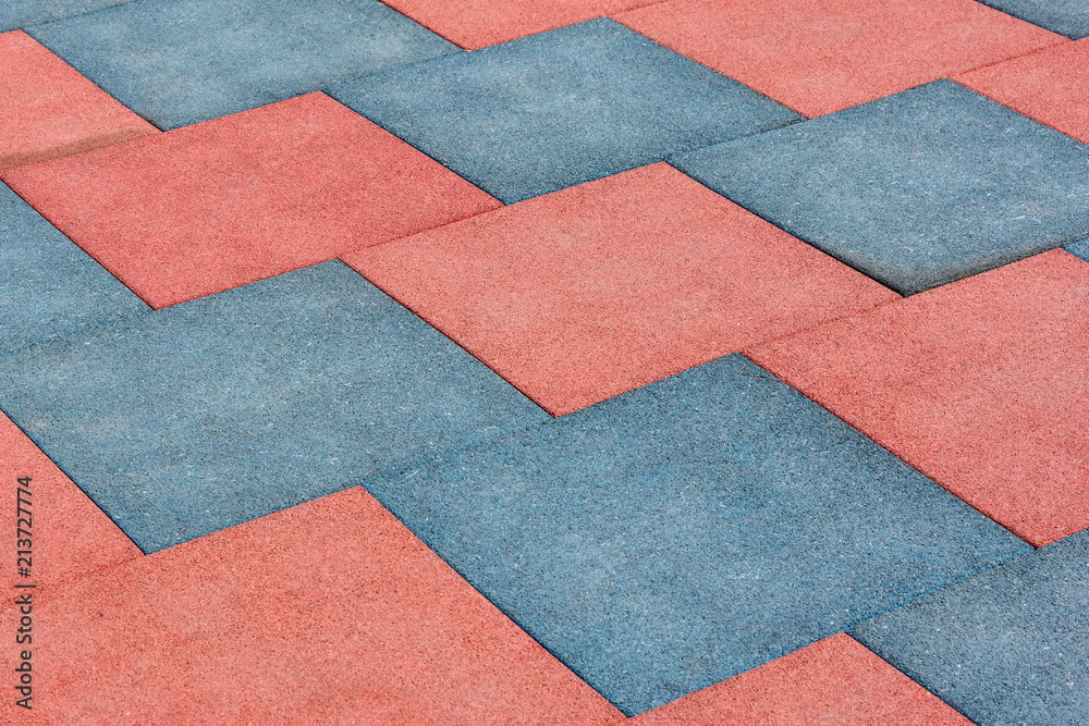 Tile of rubber crumbs on the playground. Square shape