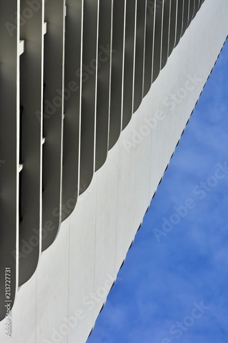 Vietnam. Nha Trang. Textured details of modern hotel residential skyscraper. Concepts of economics, financial, future. Abstract building background. The dynamic composition with your copy space