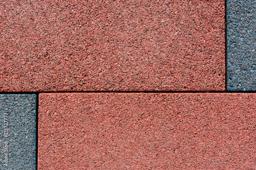 Tile of rubber crumbs on the playground.