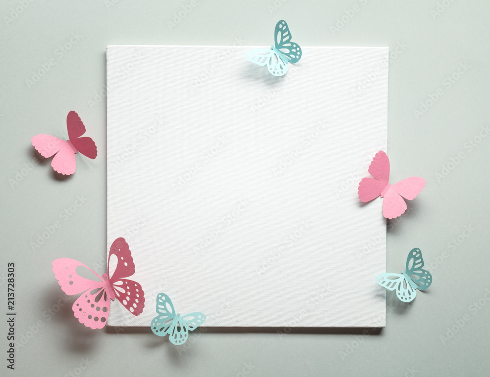 Paper butterfly on blank card