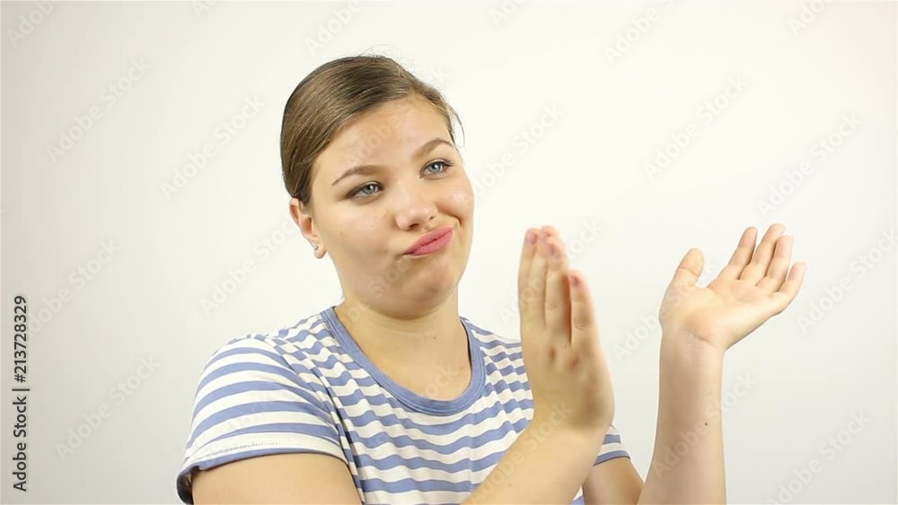 Sarcastically clapping her hands. Young beautiful woman applauding. Sarcastically clapping her hands. Young beautiful woman applauding.