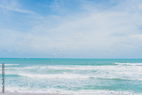Summer blue beach and sand with blue sky background.