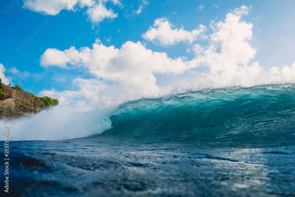 Crashing blue wave in ocean. Breaking barrel wave Crashing blue wave in ocean. Breaking barrel wave