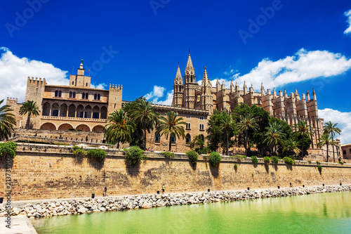 The Royal Palace of La Almudaina and La Seu Cathedral historic buildings in Palma de Mallorca, Spain © Dmitrii