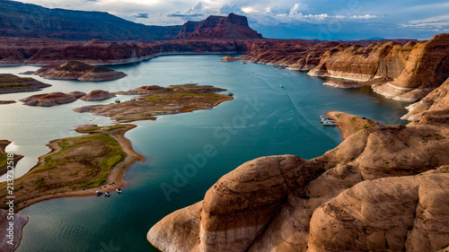 Aerial view of Lake Powell near Navjo Mountain, San Juan River in Glen Canyon with colorful buttes, skies and water photo