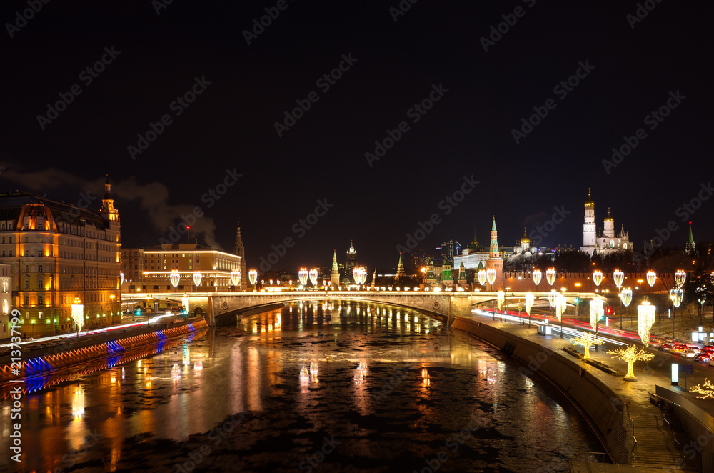 Evening view of the Moscow Kremlin and Big Moskvoretsky bridge with new year illumination, Moscow, Russia
