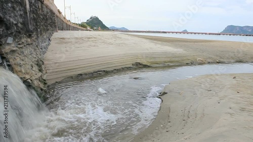 waste water drain to sea beach photo