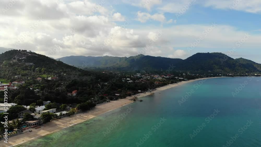 Aerial view of tropical sea and beach on white cloud and blue sky Aerial view of tropical sea and beach on white cloud and blue sky