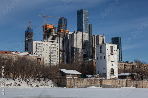 "City" and buildings around are the most famous modern sight of Moscow. Futuristic skyscrapers are standing on the riverside of the icebound Moscow River and shining on the sun.