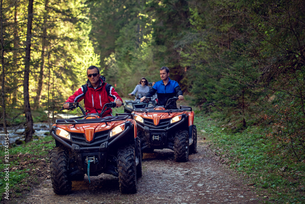 man riding atv vehicle on off road track ,people outdoor sport activitiies theme