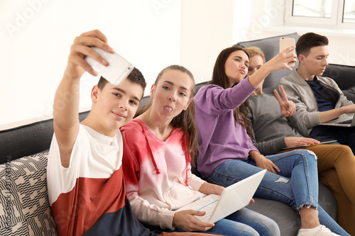 Group of teenagers with mod...