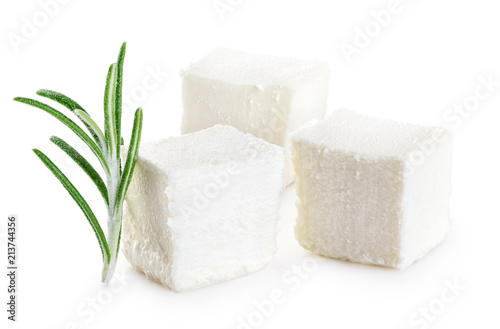 Feta cheese and rosemary isolated on white background.