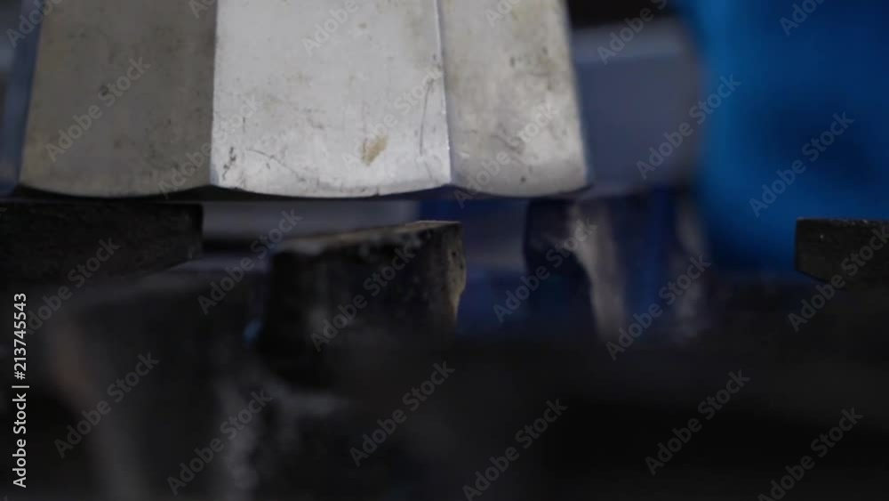 A close up shot of a kettle on a stove. A close up shot of a kettle on a stove.