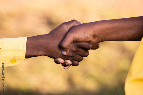 Black hands shaking