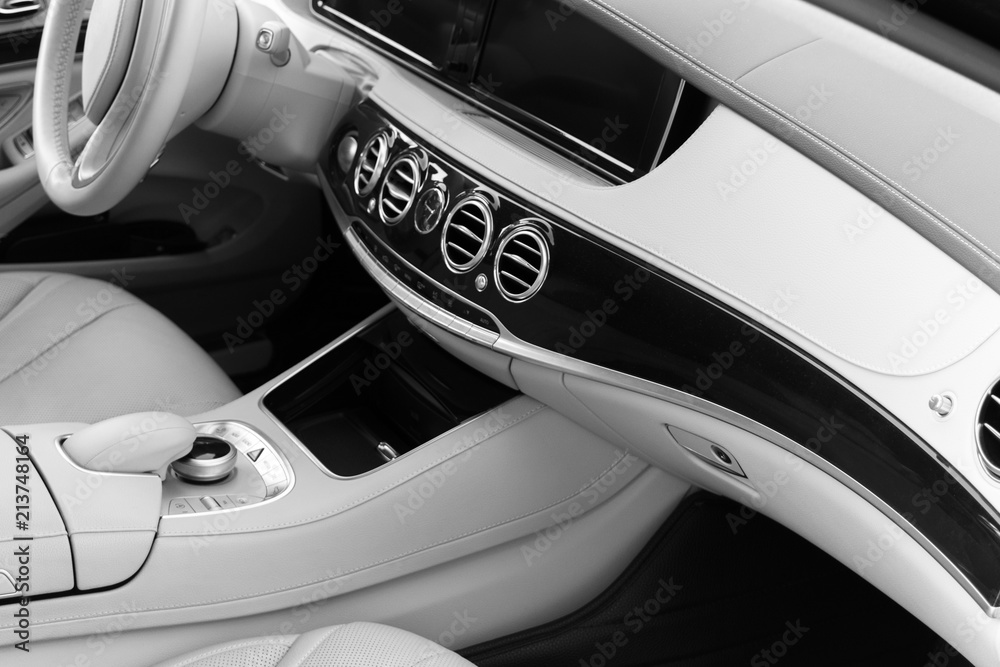 White leather interior of the luxury modern car. Leather comfortable