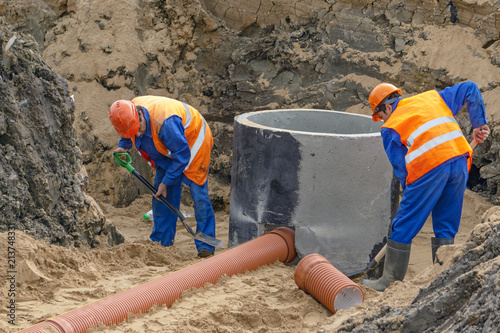 Workers instilled with a sand pipe