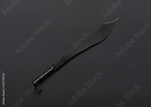 black sword on a black background