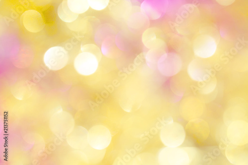 Neon shiny background with multicolored sparkles and circles. Bright fashionable colors of the season - yellow, pink and blue.