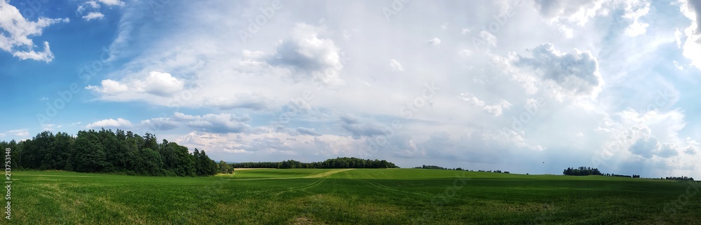 scenic panorama view of natural landscape under a cloudy sky scenic panorama view of natural landscape under a cloudy sky