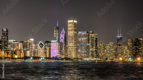 Chicago city skyline at night with bright lights