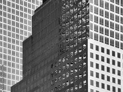 Black and white close up picture of modern architecture  urban background.