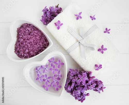 Fototapeta Naklejka Na Ścianę i Meble -  Spa towel and lilac flowers