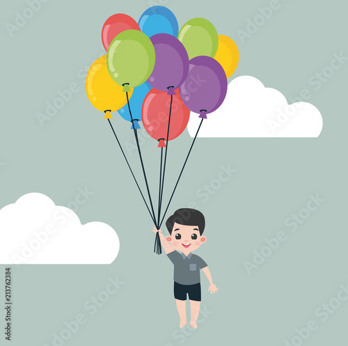 little boy  holding balloon