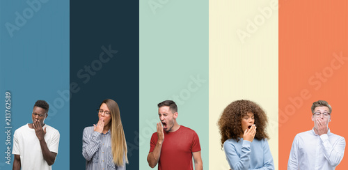 Group of people over vintage colors background bored yawning tired covering mouth with hand. Restless and sleepiness.