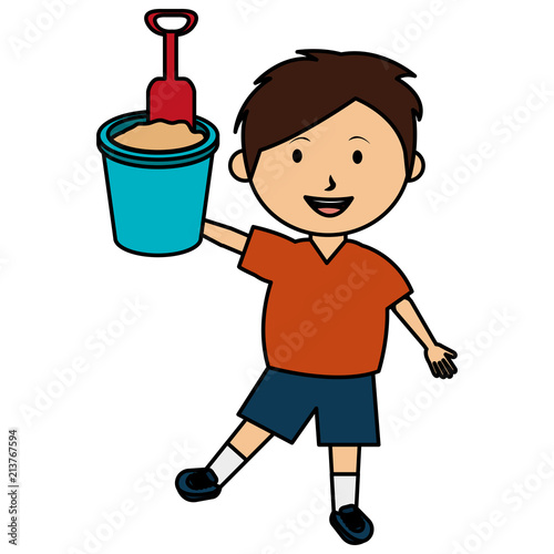 little boy with sand bucket