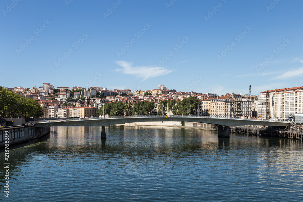 Modern bridge over the Rhone river in the heart of Lyon in France second largest city on a sunny summer day