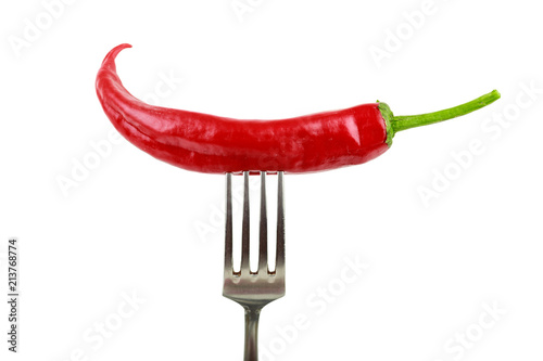 red chili pepper on the fork © Sergey