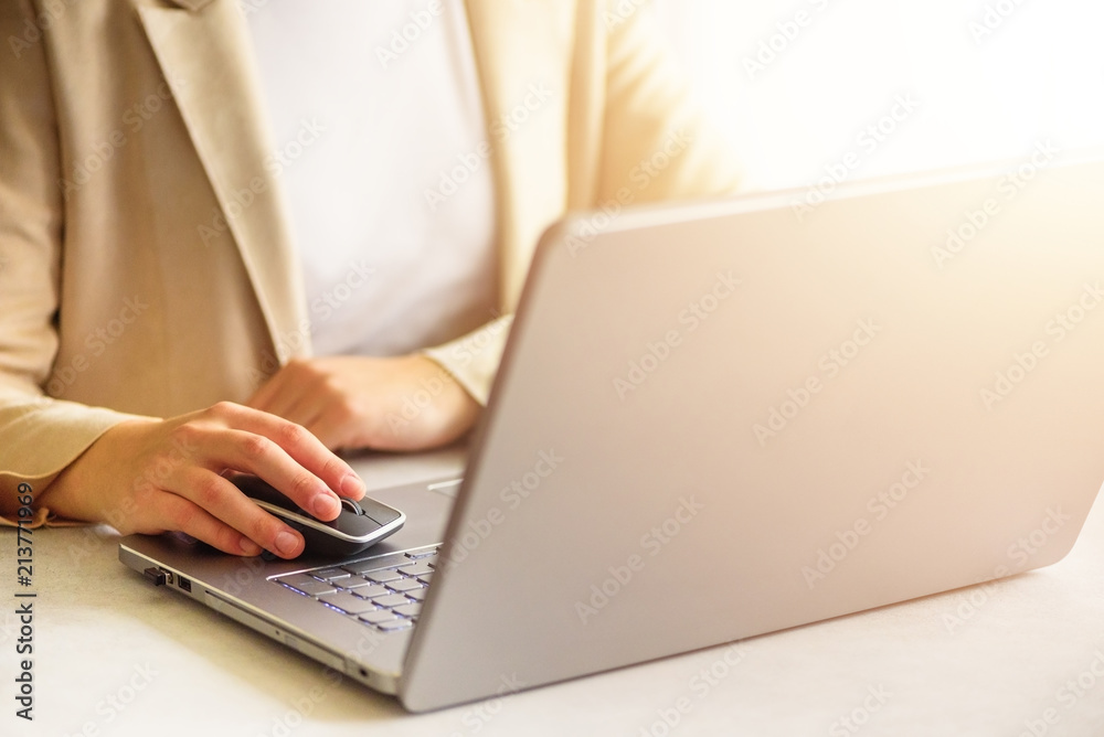 Businessman working with laptop on light background. Copy space. Business, remote work, always connect, online banking, online shopping concept. Businessman working with laptop on light background. Copy space. Business, remote work, always connect, online banking, online shopping concept.