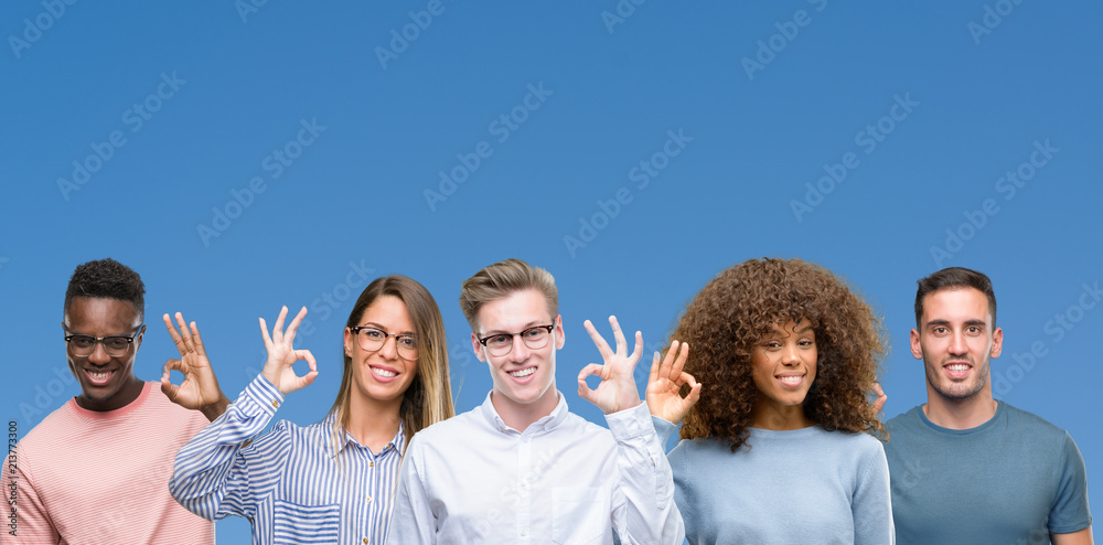 Composition of group of friends over blue blackground smiling positive doing ok sign with hand and fingers. Successful expression. Composition of group of friends over blue blackground smiling positive doing ok sign with hand and fingers. Successful expression.