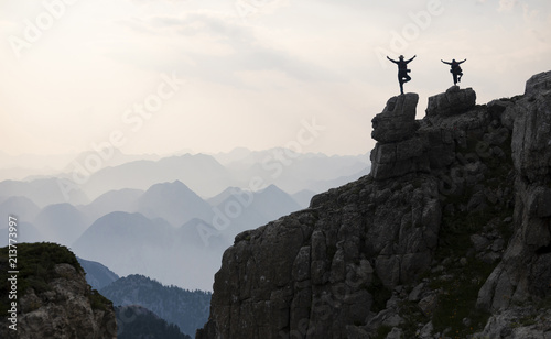 Canvas Print people in yoga position, peace and therapy in high mountains