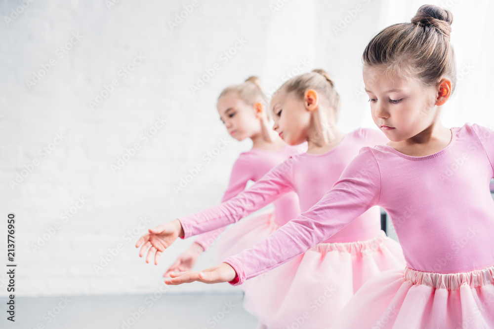 beautiful little kids in pink clothing dancing in ballet studio beautiful little kids in pink clothing dancing in ballet studio